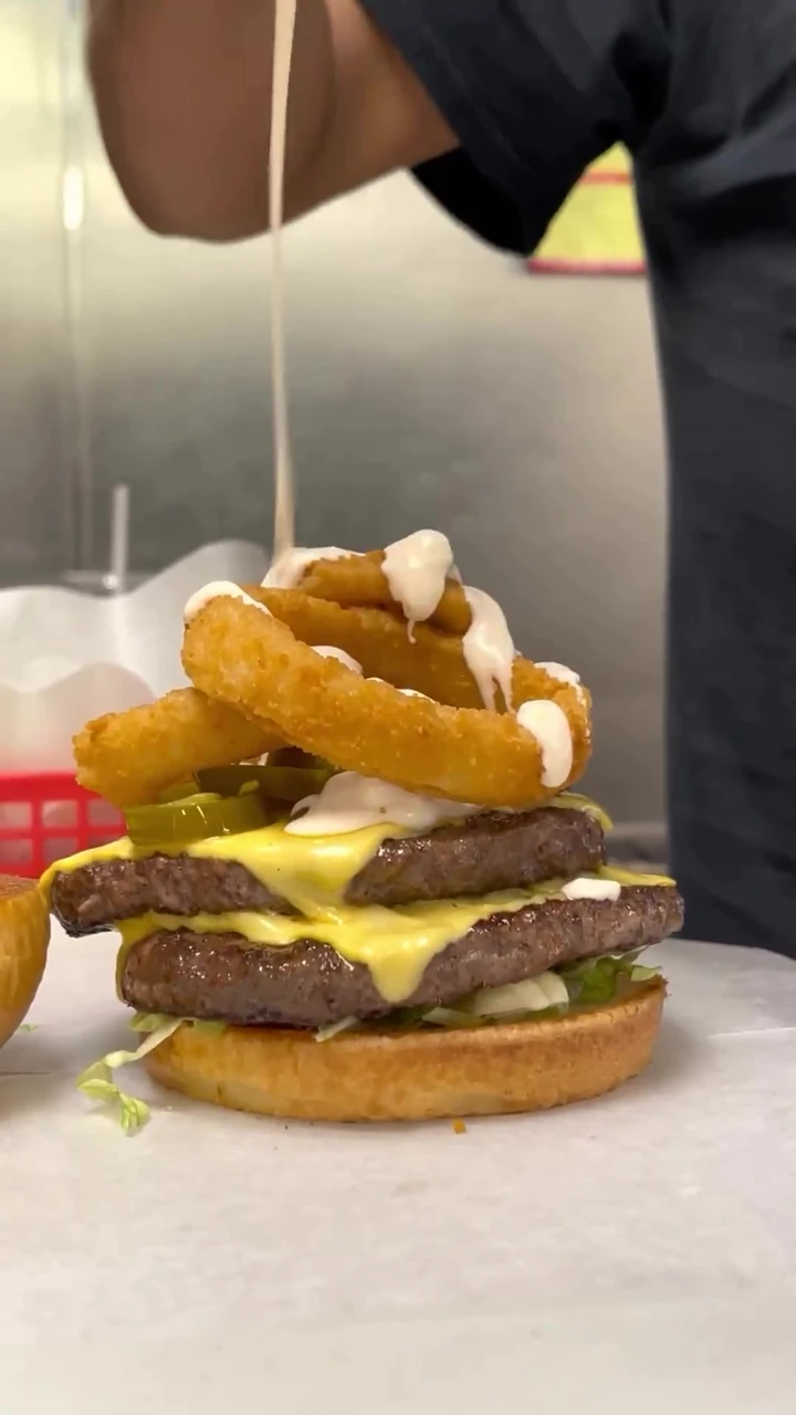 Chubby’s double cheeseburger with onion rings and sauce